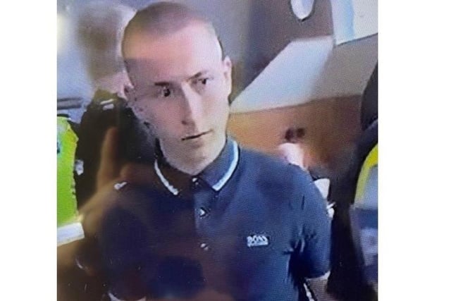 The seventh man was a white man in his 20s with very short light-coloured hair. He was wearing a dark coloured Hugo Boss polo shirt. Photo from Sussex Police. SUS-211215-175616001