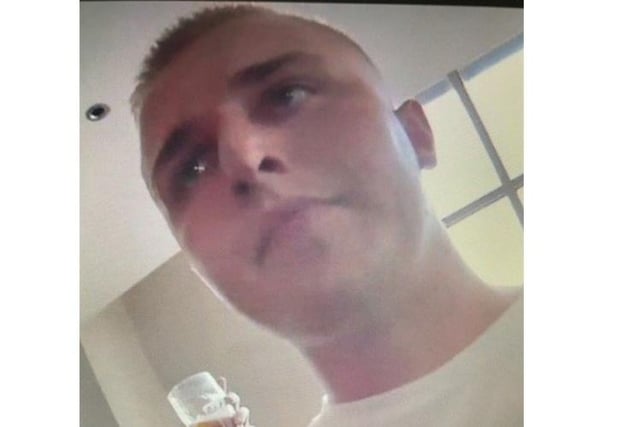 The sixth is a white man in his 20s with short hair. He was wearing a white t-shirt. Photo from Sussex Police. SUS-211215-175606001