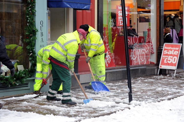 Pavements being cleared in Chichester in December 2010. Picture: Kate Shemilt C102173-7