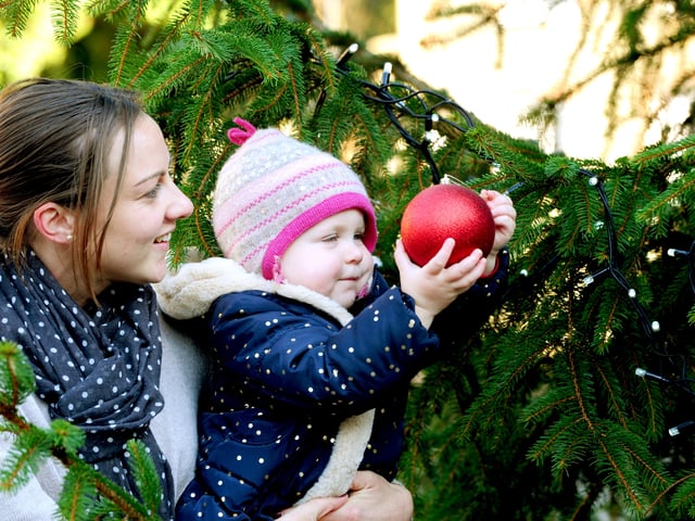 Lola Purton and her daughter Evie enjoying the Midhurst Christmas tree in The Square in 2016. Picture: Kate Shemilt