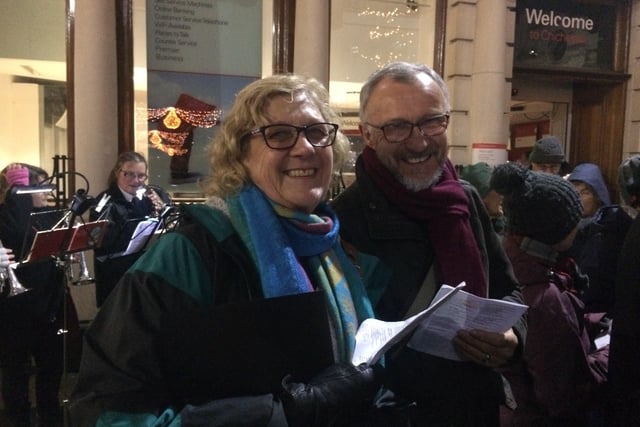 Members of Chichester Community Choir at the Chichester Christmas lights switch on in 2018. Picture: Anna Khoo