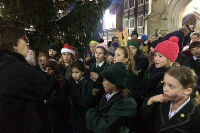 Oakwood School choir at the Chichester Christmas lights switch on in 2018. Picture: Anna Khoo