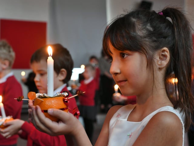 Year 2 pupils at Dogsthorpe infants school attending their annual Christingle Service at the school. Pictures: David Lowndes