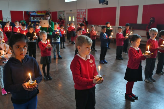 Year 2 pupils at Dogsthorpe infants school attending their annual Christingle Service at the school. Pictures: David Lowndes
