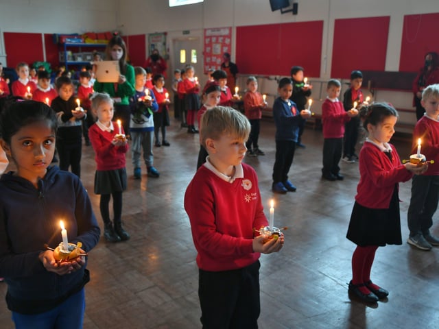 Year 2 pupils at Dogsthorpe infants school attending their annual Christingle Service at the school. Pictures: David Lowndes