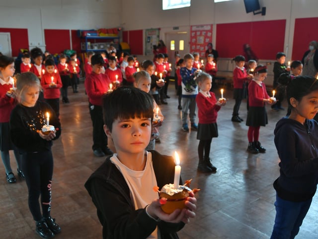 Year 2 pupils at Dogsthorpe infants school attending their annual Christingle Service at the school. Pictures: David Lowndes