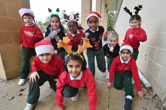 Pupils at The Peterborough School taking part in their annual Santa Smile run.
Nat21 EMN-210912-115955009