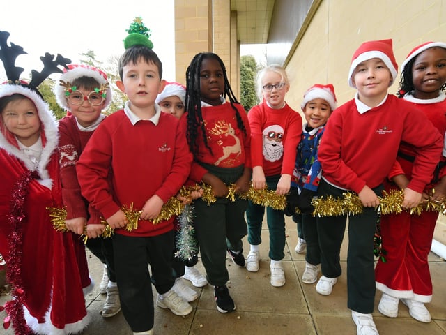 Pupils at The Peterborough School taking part in their annual Santa Smile run. Nat21 EMN-210912-120007009