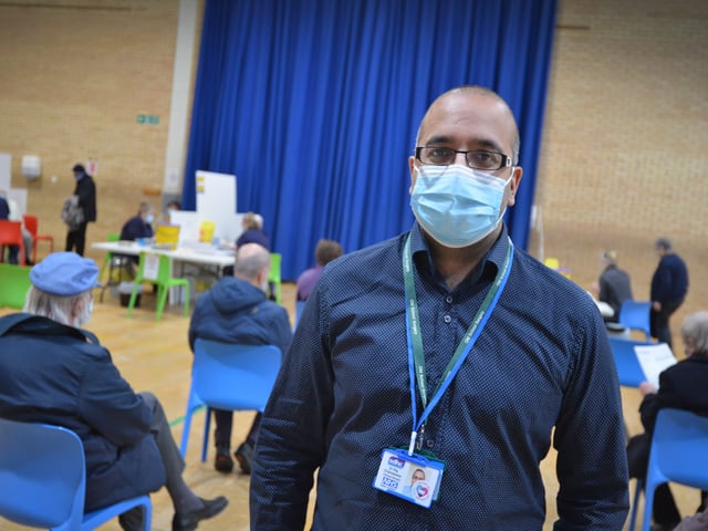 Dr Raj Chandarana, clinical director of South Downs Health and Care, at the covid-19 vaccination centre in The Sovereign Centre SUS-210126-131802001
