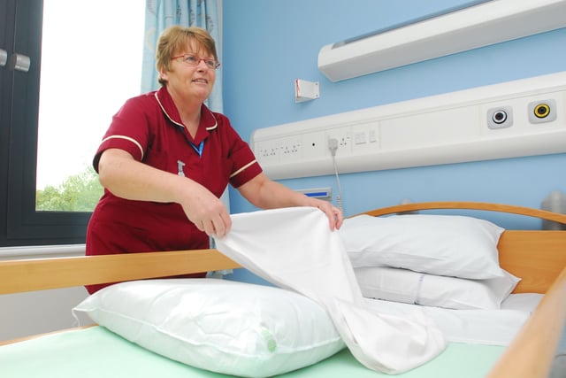 Opening of new Peterborough City Care Centre hospital on Thorpe Road, Peterborough. A nurse makes up a bed on the Intermediate Care Unit.