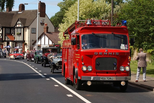 Longthorpe golden jubilee carnival pictured on Thorpe Road with vintage cars leading the parade.