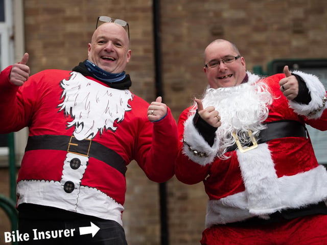 Jon Andrews and Gavin King both dressed up as Santa for the delivery