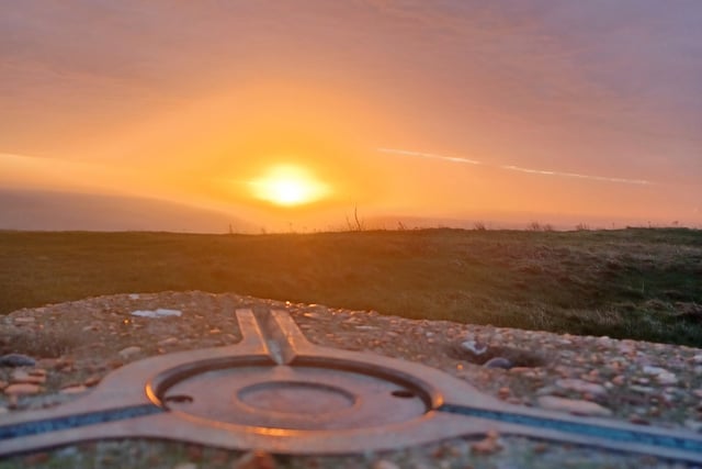 Triangulation point at Beachy Head at sunrise. Taken by Tracy Owen on Saturday December 11. SUS-211221-134512001