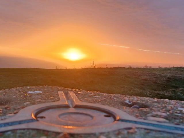 Triangulation point at Beachy Head at sunrise. Taken by Tracy Owen on Saturday December 11. SUS-211221-134512001