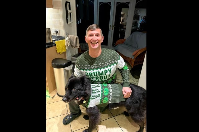 Giles and his dog, Major, in matching Christmas jumpers. From the slogan to the passive aggressive eye roll, I have never seen anything more perfect.