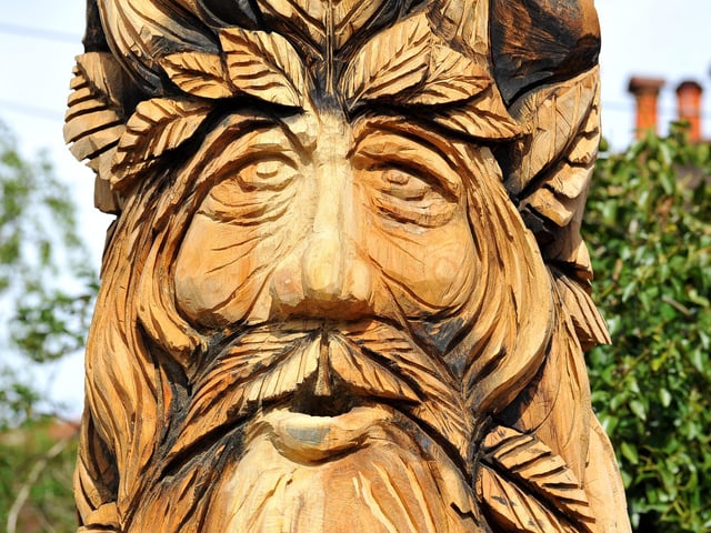 Alasdair Craig, owner and sculptor at Sussex Chainsaw, with his latest, nearly completed work in Lodge Lane, Keymer. Pic S Robards SR2105185 SUS-210518-172935001