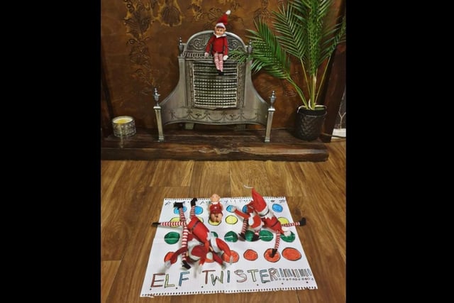 Who says elves can't join in with the festive fun? Make a mini Twister mat and put them in positions we can only dream of being flexible enough to do.