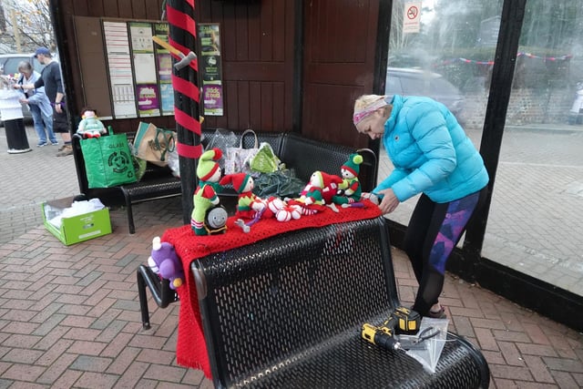 Installing the festive yarnbomb displays