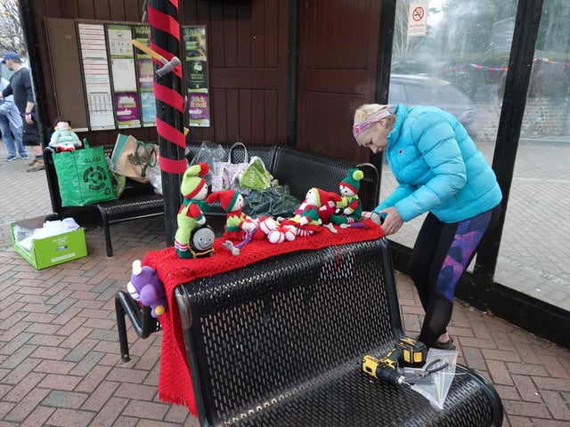 Installing the festive yarnbomb displays