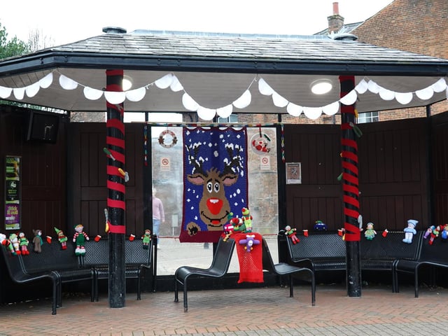 The bus stop looks very festive