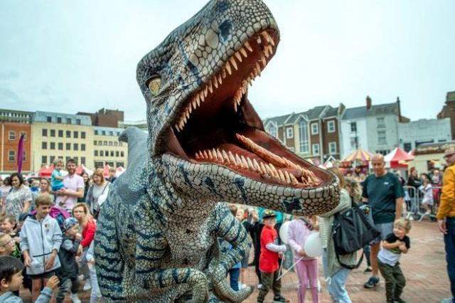 Dinosaurs roamed Northampton town centre for the first time in around 65 million years to entertain the public on Saturday, July 24 as part of Northampton Town Centre Business Improvement District's event.
