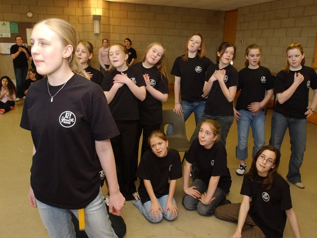 Bona Colton, 13, (left) and fellow KYT members rehearse at St Mary's church, New Road, for a showcase of recent work. Ca you name the year?