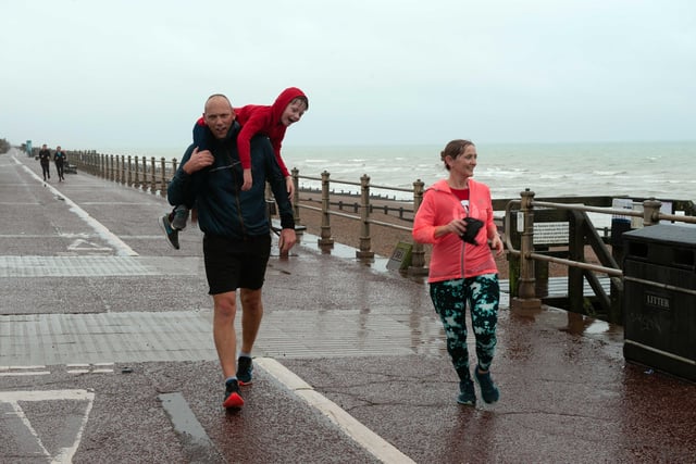 HY Runners raising money for Charity for Kids. Photo taken by Frank Copper on St Leonards seafront 27/12/21. SUS-211228-082650001