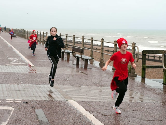 HY Runners raising money for Charity for Kids. Photo taken by Frank Copper on St Leonards seafront 27/12/21. SUS-211228-082130001