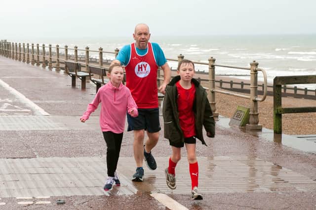 HY Runners raising money for Charity for Kids. Photo taken by Frank Copper on St Leonards seafront 27/12/21. SUS-211228-082840001