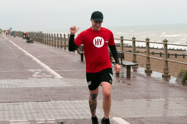 HY Runners raising money for Charity for Kids. Photo taken by Frank Copper on St Leonards seafront 27/12/21. SUS-211228-082057001