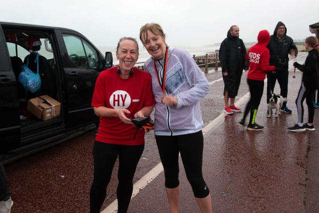 HY Runners raising money for Charity for Kids. Photo taken by Frank Copper on St Leonards seafront 27/12/21. SUS-211228-082617001