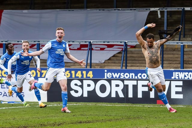01/05/21 Jonson Clarke-Harris sparked wild celebrations after scoring the goal that secured promotion back to the Championship. Posh fought back from 3-0 down at home to Lincoln to draw 3-3 with Clarke-Harris equalising with a 94th minute penalty.