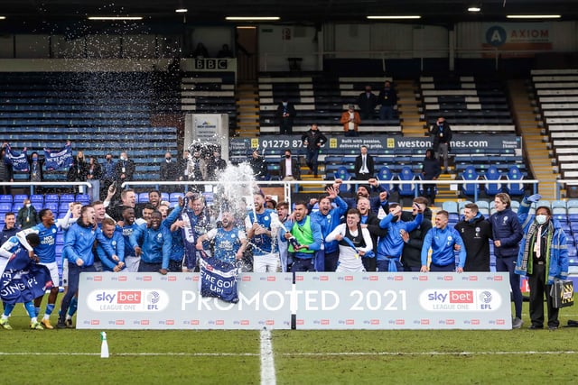 01/05/21 That 'champagne' moment which officially marks  a promotion win. Captain Mark Beevers is in charge of the bubbly.