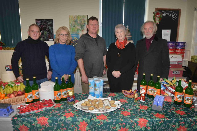 A few of the Surviving Christmas team getting ready for Christmas Day at the Salvation Army Hall in Hastings. Dec 24.