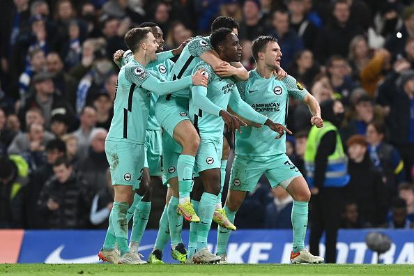 Brighton celebrate their leveller at Chelsea