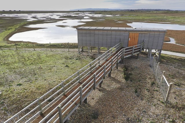 A bird hide at Rye Harbour Reserve .