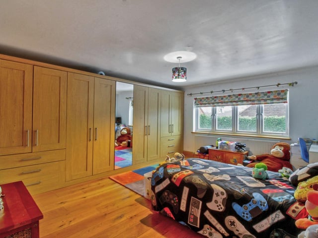 One of the seven bedrooms