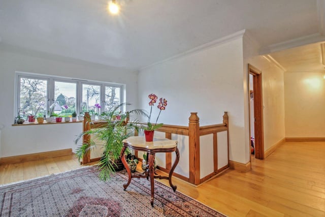 Upstairs the oak staircase takes you to the spacious landing with a large window over looking the front garden.