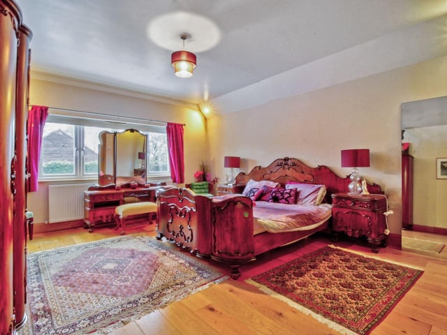 One of the seven bedrooms