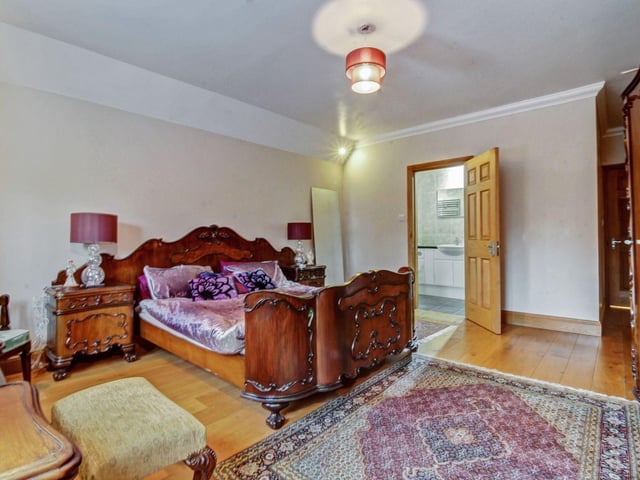 One of the seven bedrooms