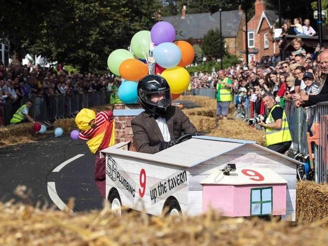 The theme for this year's Soap Box Derby was 'Earls Barton is going to the movies!' There was a total of 25 entries this year, each one dazzling crowds with their creativity. In first place was Danny Golden with his cart 'White Mills Warrior' followed by Lee Garner with 'Plonks Peddlers' and Elliot Denney with 'Hendrix McQueen'. Other striking soap boxes include 'The Hoghorts Express' - inspired by Harry Potter - by Nick Burles and 'Up The Tavern' - inspired by the Disney Pixar animated film, 'Up - by Steve Battams.