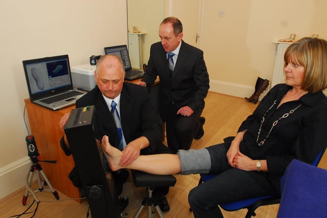 Fane Foot Clinic in Dogsthorpe Road. 
Stephen Pinning and Adrian Woolley scan a client's foot