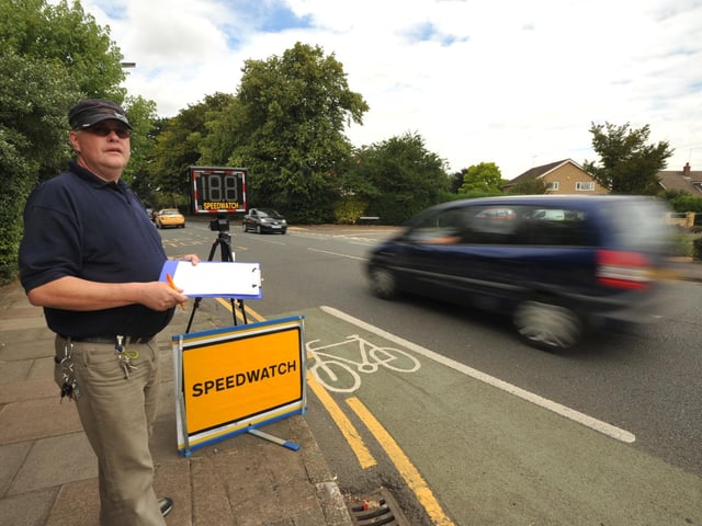 Community crime fighter Kevin Bell, manning a Speed Watch operation on Dogsthorpe Road
