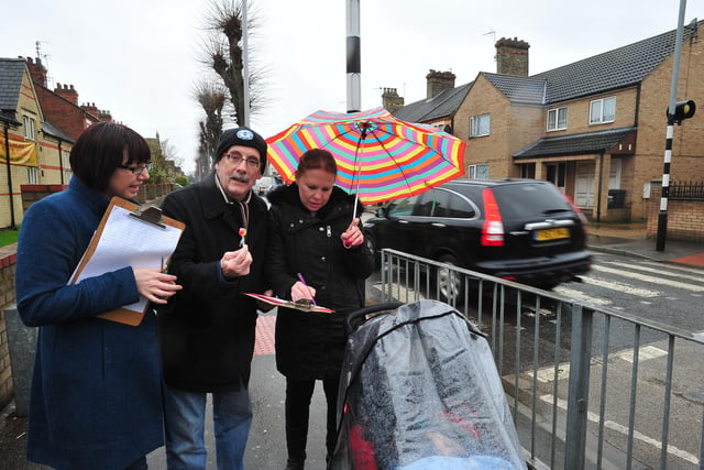 Nicola Day with  John Shearman collecting signatures for lollipop appeal at Dogsthorpe Road .