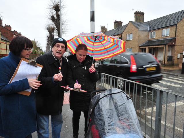 Nicola Day with John Shearman collecting signatures for lollipop appeal at Dogsthorpe Road .