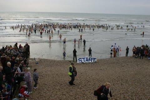 East Wittering New Year Big Dip 2022. Picture from Jerry Goodman SUS-220201-101910001
