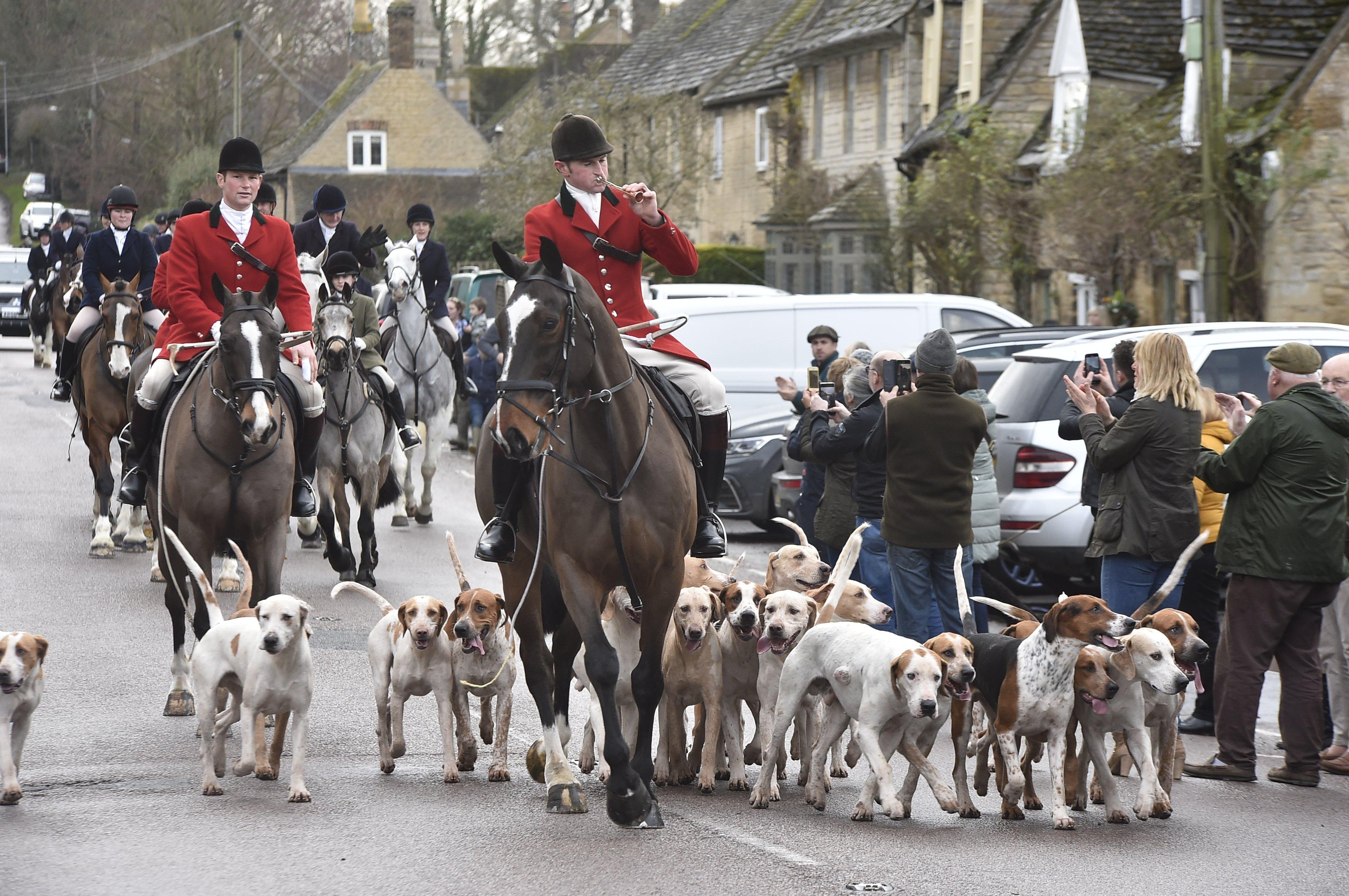 New Year's Day Fitzwilliam Hunt pass through Wansford Village.