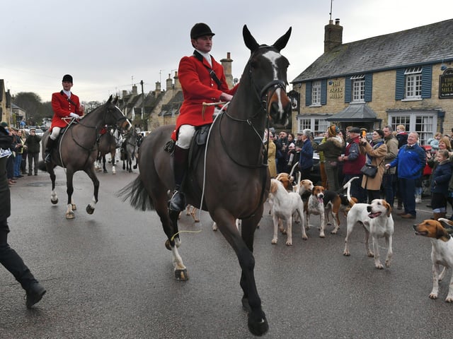 New Year's Day Fitzwilliam Hunt pass through Wansford Village.
