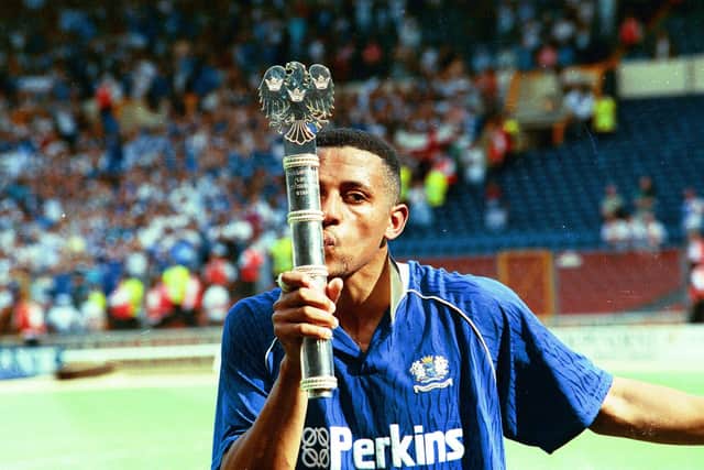 Ken Charlery kisses the 1992 Wembley play-off final trophy after Posh beat Stockport 2-1.