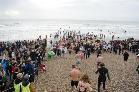 East Wittering New Year Big Dip 2022. Picture from Jerry Goodman SUS-220201-102634001